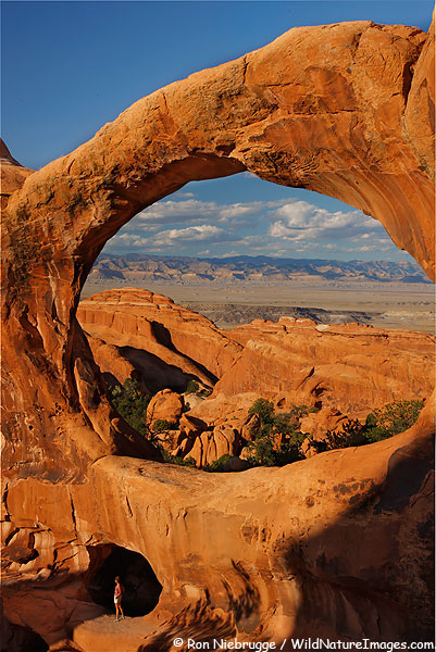 Janine in the lower arch of Double O Arch, Arches National Park, Utah.