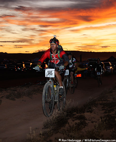 A rider at sunset, 2009 24 Hours of Moab Mountain Bike Race, Moab, Utah.