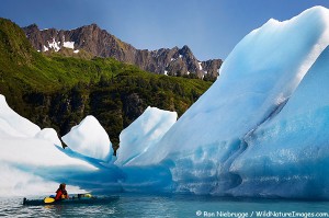 Janine kayaking in Bear Glacier Lagoon, Kenai Fjords National Park, Alaska.