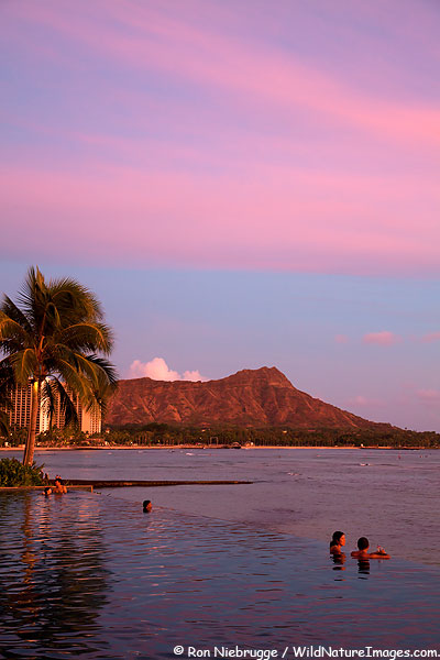 Sunset from the infinity pool at the Sheraton Waikiki, Waikiki Beach, Honolulu, Hawaii.
