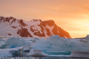 Giant icebergs at sunset, from Booth Island, Antarctica.