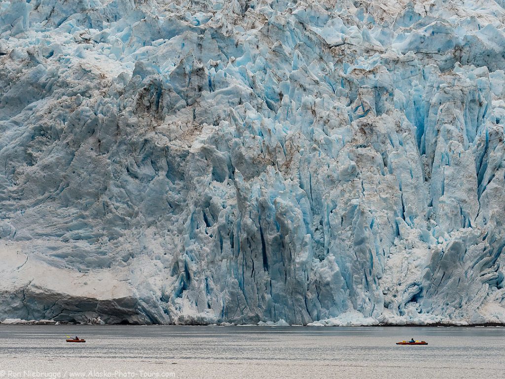 Kayaking in front of Holgate Glacier, Kenai Fjords National Park, Alaska. 